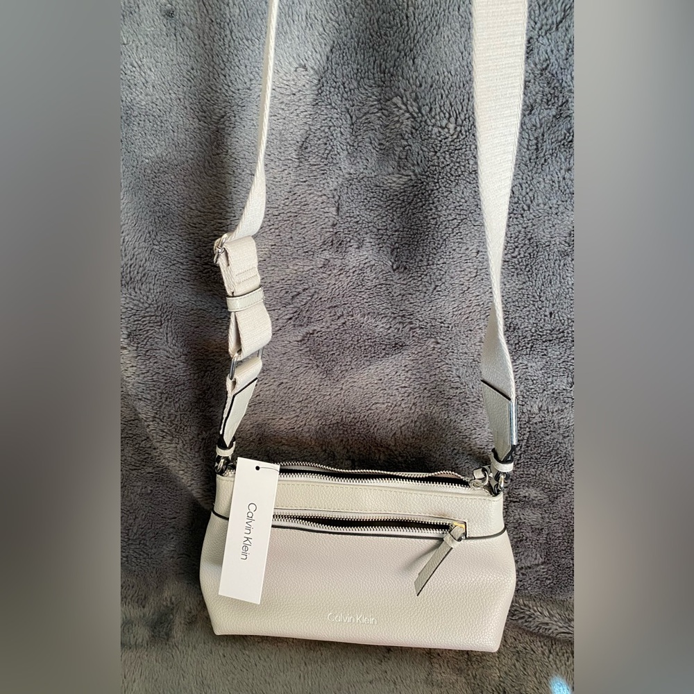 Calvin Klein Light Gray Crossbody Bag with adjustable comfort strap